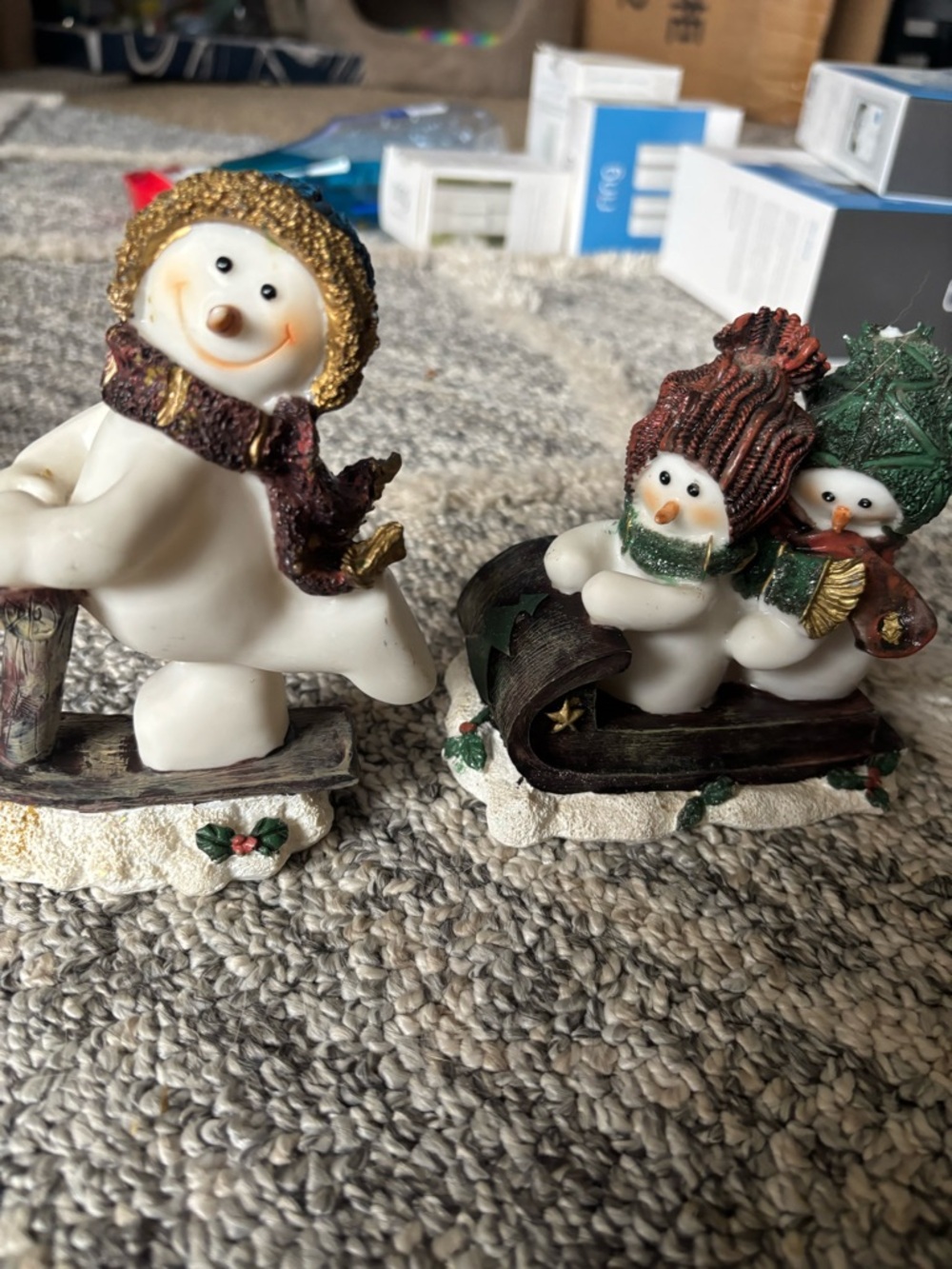 Whimsical White Snowman Figurine Duo with Gold and Brown Accents